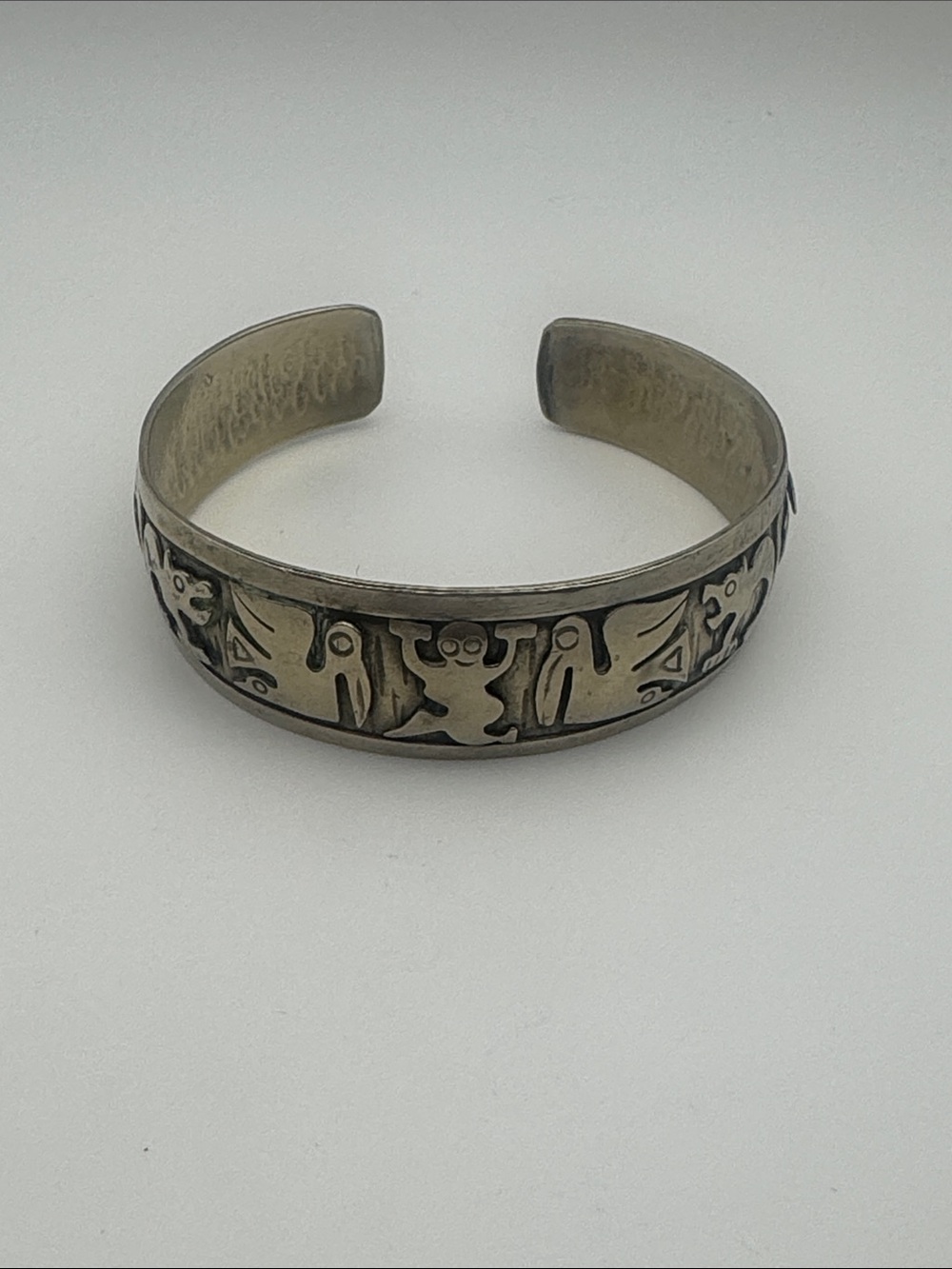 Silver-Tone Cuff Bracelet with Carved Motif